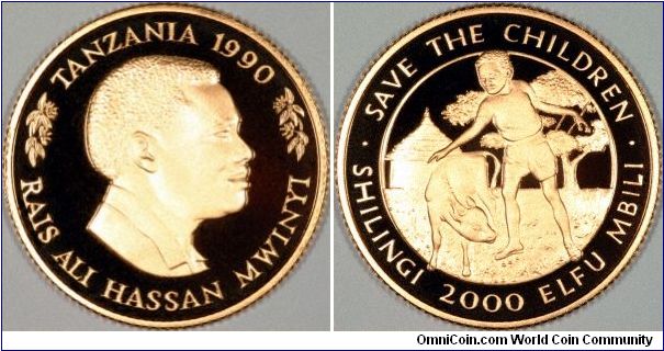Tanzanian boy tending a calf on a gold proof 'Save the Children' 2000 shillings, with Rais Ali Hassan Mwinyi on the obverse.