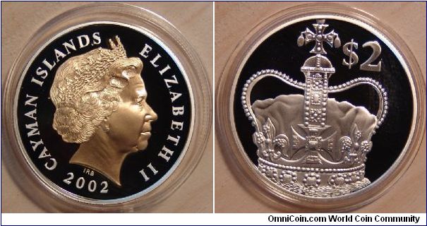 A 2002 $2 silver coin from the Cayman islands part of the Queen Elizabeth II Golden Jubilee Crown Collection