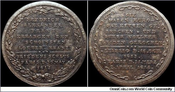 1814 Paix de Paris, Austria.

Actually engraved by the Czech Zbirow (though some authorities make him Polish) it is a medal made of 'pig iron'. The legends essentially praise the three continental kings of achieving the beautiful Peace of Paris. The reverse talks of breaking the chains of Europe and the relief of those peoples' sufferings.                                                                                                                                                                  