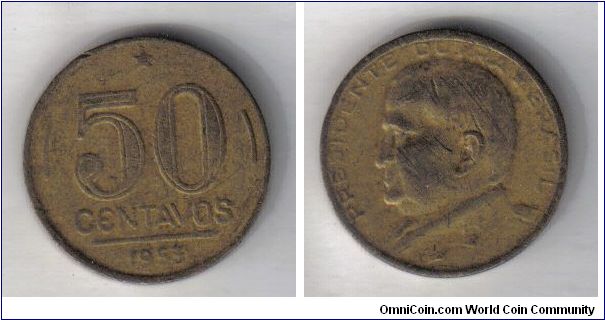 Moeda brasileira com o rosto do Ex Presidente Dutra. Valor de $50 centavos.