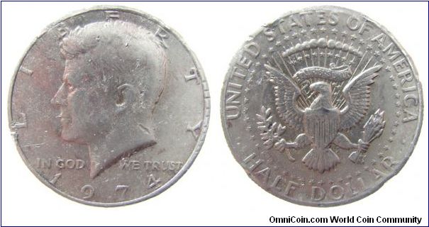 1974 (still ugly) Kennedy half dollar - after  electrolysis cleaning