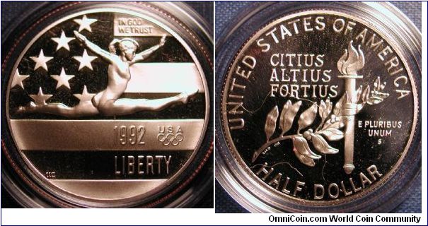 1992-S Olympic Half Dollar Proof

Olympics (France and Spain) Half Dollar

Year: 1992
Mintage (max.): 600,000,000
Public Law: 101-406
U.S. Mint Facility: San Francisco, CA (Proof), Philadelphia, PA (Uncirculated)

Obverse
Engraver: William Cousins
Description: Gymnast in motion.

Reverse
Designer: Steven M. Bieda
Description: Inscribed Citius, Altius, Fortius (Faster, Higher, Stronger).