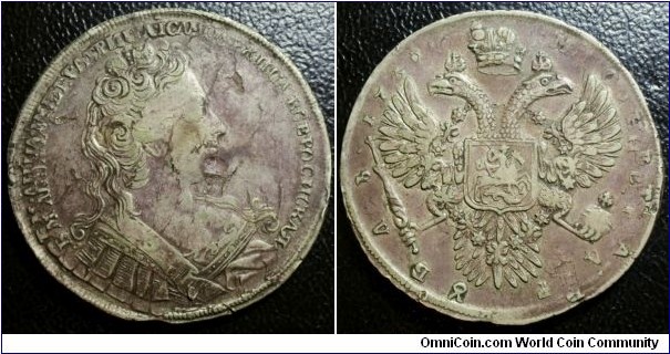 Russia 1730 1 ruble. Possible overstrike over an unknown European coin? Double struck.

Notice the two additional stars at the text area. Perhaps a pattern? Also note how the overstruck crown seems to be cracked off against the underlying crown at the reverse.

If you know what the underlying image could be, please email me!!!

Weight: 28.58g