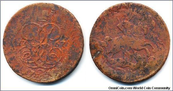 Russia overstriked 1757 2 kopeks. Ok, this coin is depicted a bit too red in the picture, but the story is that this coin is a double overstrike. 1757 2 kopeks over 1756 1 kopek over 1727(? - date unreadable) 5 kopek coin. You don't need a good eye to tell that this is a double overstrike - there is a date, 1756 at the bottom of the obverse and there is a faint cross at the background in the reverse. 
Fasinating piece! :)