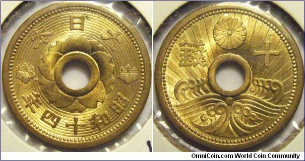 Japan 10 sen Showa 14 (1939). Probably better known as the wave coin because of it's design. It may seem ridiciously simple yet powerful... Quite an interesting coin.