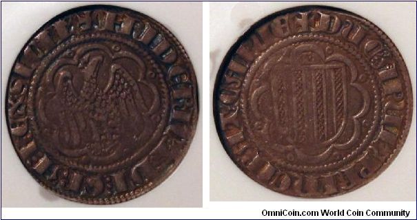 SICILY/MESSINA.  Pierreale of Federico III D' Aragon.  Spahr 24.

D:+FRIDERIC T: DI: GRA: REX. SICIL' surrounded by two circles of beads.  A crowned eagle with spread wings in a decoration made of a ring in 8 segments with little rings outside the junction of the segments. R: + DUC'. APUL' t PRINCIPAT'. CAPUA. Aragonese coat of arms inside the same decoration of the obverse, on the left the letter I. AR: pierreale; c.b. Messina mint.