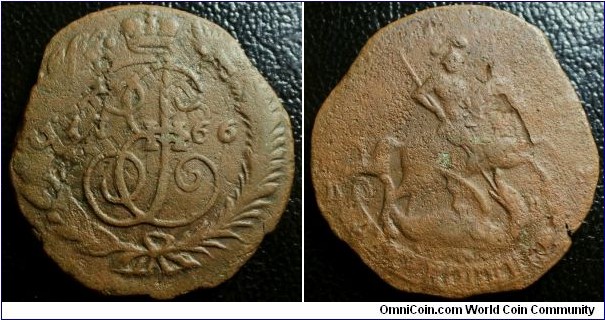 Russia 1766 2 kopeks SPM overstruck over 1762 4 kopeks. You can see that this poor little coin has been shaved by the edges. This coin too is unusually too thin and has a horrible crack through its planchet. On the reverse, you can see that a flak of the copper has been peeled off (around the horse's neck). Nevertheless, an interesting piece. Weight: 14.41g