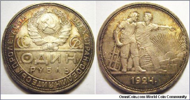 Russia 1924 1 ruble. Mintmaster PL. Also better known as the worker ruble, this is the very last crown sized silver coin that was minted in the whole of Russian Empire history. :( Weight: 19.95g.