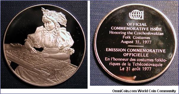 1977 International Society of Postmasters Official Commemorative Silver Proof Medal.  Commemorating Czechoslovakian Folk Costumes.  It came with a specimen of the official stamp released in Czechoslovakia.