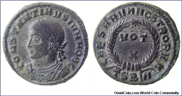 Constantine II
OBVCONSTANTINVS IVN NOB C, laureate draped bust
REV: CAESARVM NOSTRORVM, laurel wreath around VOT X