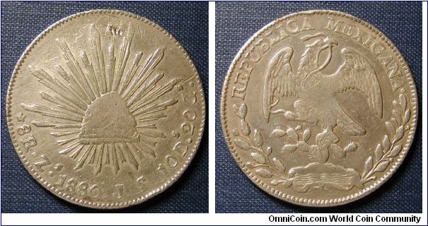 1880 Mexico 8 Reales Zacateca Mint.  Some damage.