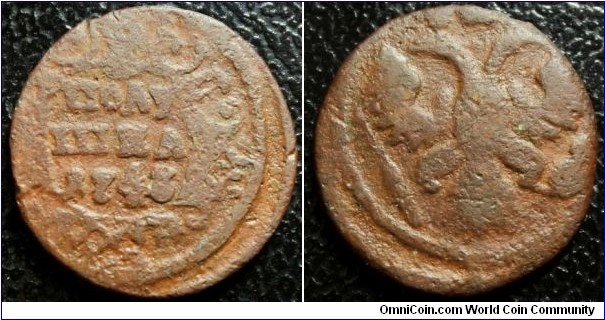 Russia 1743 polushka. (1/4 kopek). An offstruck coin. The date on this coin seems to be quite difficult to read. I initially thought it is 1748 but it most likely is 1743.

Weight: 3.39g