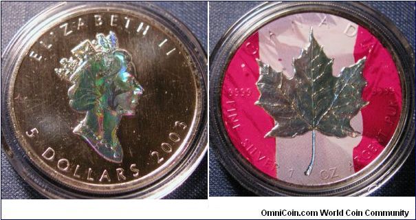 2003 Canadian Maple Leaf Colorized reverse, holographic silver maple leaf and portrait.