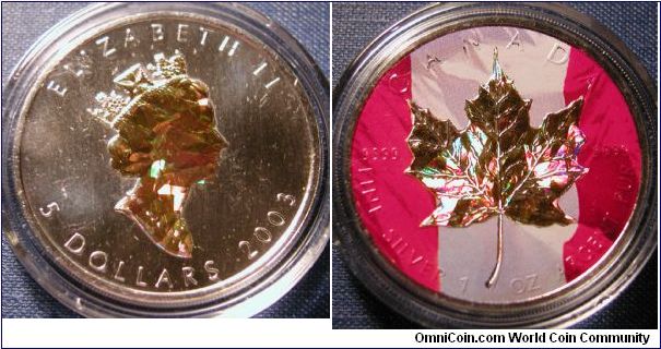 2003 Canadian Maple Leaf Colorized reverse, holographic gold maple leaf and portrait.