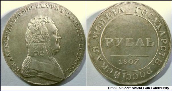 Russia 1807 1 ruble (copy). Another fantasy of the ever scarce pattern coin which features Alexsander I. 

However the reverse features an interesting idea, which shows the text Russian Government Money. This text was borrowed off from the 1802-04 rubles, but the text did not last too long after 1807. (Maybe up to 1810?) Who would want their coins that explicitly tells them that it is government's money??? I wouldn't!

I can't afford an original and hence a copy.