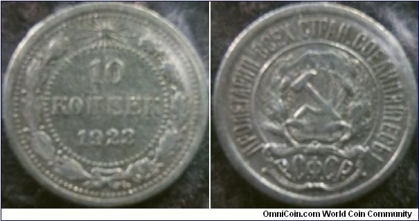 Russia 1923 10 kopeks. Pretty worn. Hence the grade VG.