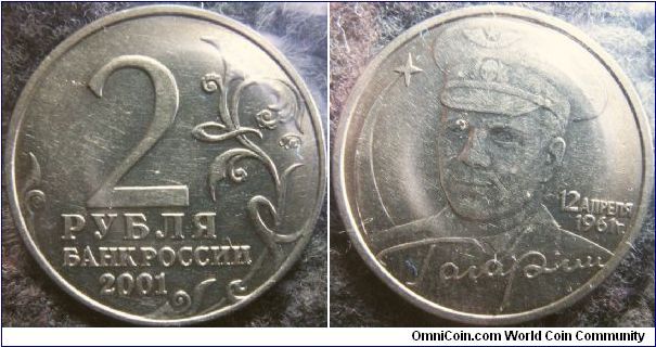 Russia 2001 2 rubles featuring Yuri Gagarin. Minted as the 40th anniversary of this great Russian cosmonaut. 

Mintmark: MMD.