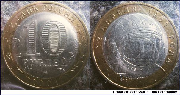Russia 2001 10 rubles (bi-metal)featuring Yuri Gagarin. Minted as the 40th anniversary of this great Russian cosmonaut. 

Mintmark: MMD.