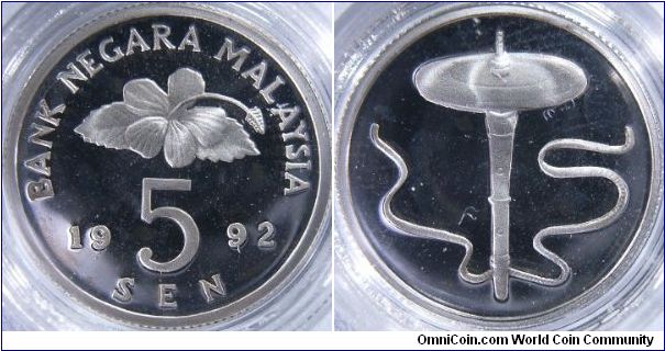 Malaysia 1992 silver proof 5 sen. The reverse of this coin features a top, which is a popular and traditional sports in Malaysia. This is usually done in the past as a belief that it will bring in good harvest.