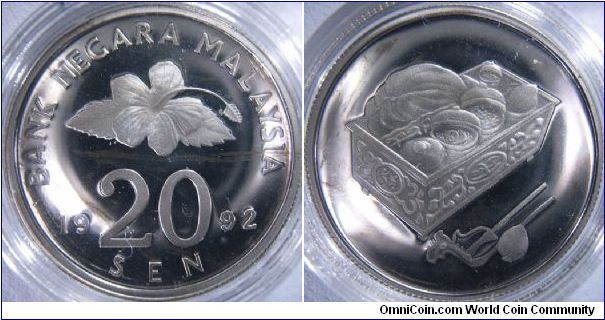 Malaysia 1992 silver proof 20 sen. Featuring a tepak sirih, or rather a box, this is usually used to store betel leaves and other materials. This is still being used currently during auspicious times. Of how it is being used, I am not too sure either.