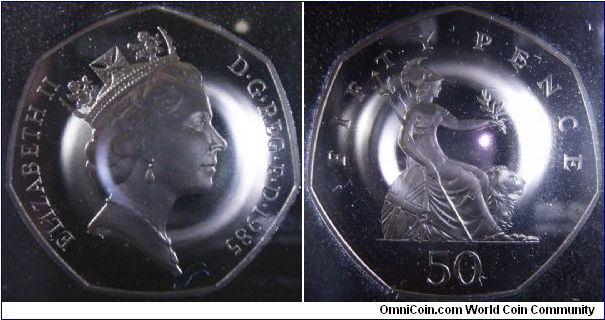 UK 1985 proof 50 pence. Featuring the seated figure of Britannia, which appeared on UK coinages for over 300+ years. This is also the first coin in the world to have the 7 sided planchet.