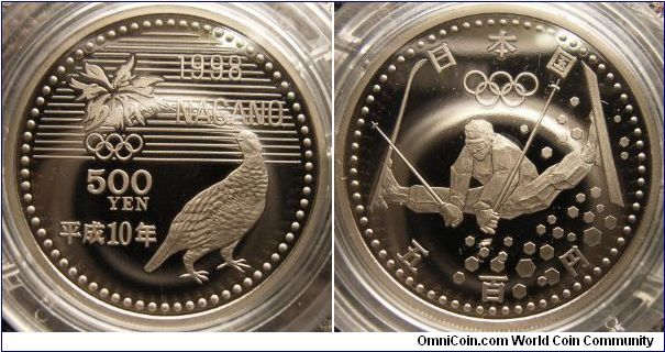 Japan 1998 Nagano Olympics Third Series 500 yen. Featuring a Grouse and freestyle skiing. Mass of this coin is 7.2grams and minted in 75% Cu, 25% Ni.