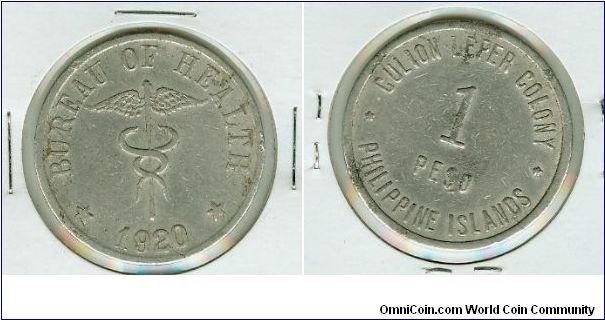 This is a semi-key scarce year for these Zinc One Peso coins, and this one is in VF+ condition.