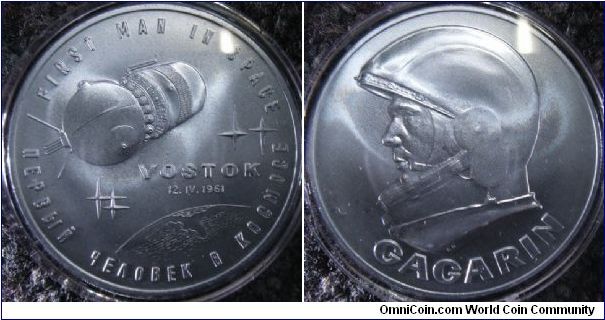 A mysterious medal that appears together with the Gagarin 3 ruble silver commemorative ruble. It is rumored to be made of ex-satellite metal but I am not believing it yet. 

Interesting how Gagarin's name is in English...