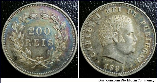Portugal 1891 200 reis. Insanely toned which I found it difficult to capture! An XF, except for the awful ding marks :( Weight: 4.98g