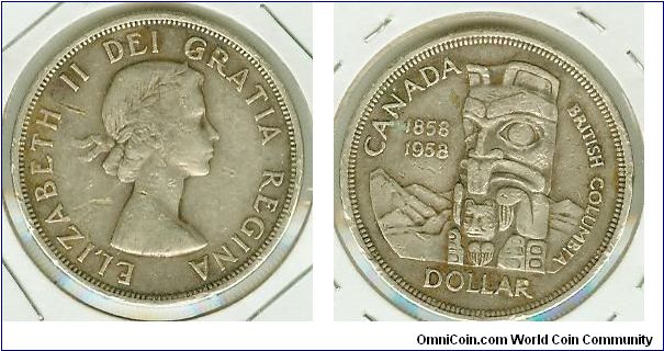 B.C. BRITISH COLUMBIA 100 YR COMMEMORATIVE ONE SILVER DOLLAR. LOVE THE REVERSE!!