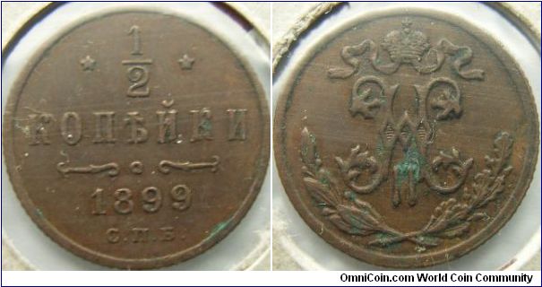 Russia 1899 1/2 kopek. Somewhat XF but with a fair bit of verdigis.