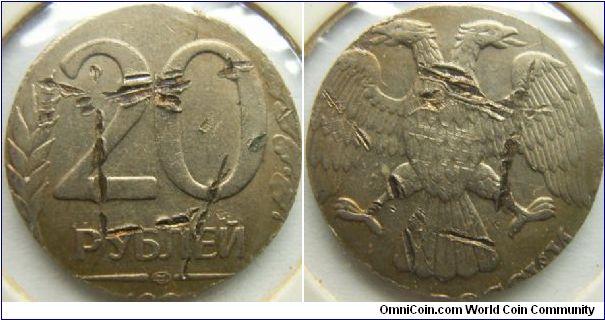Russia 1992(?) LMD 20 rubles. It seems that either this coin was accidently recut or it could be someone who was fooling around. Diameter: 20mm.
