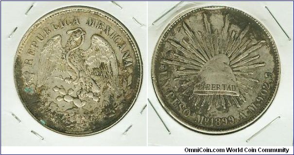 MEXICO 1899 MO/AM SILVER UN PESO CAP N' RAYS. THESE COINS WERE CIRCULATED IN THE PHILIPPINES DURING THE SPANISH OCCUPATION.