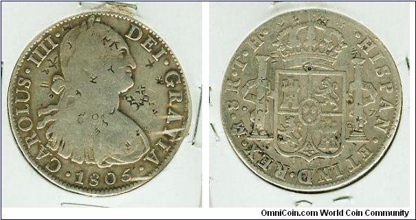 NICE CAROLUS IIII 8 REALES SILVER CROWN WITH SOME INTERESTING CHINESE CHOPS.