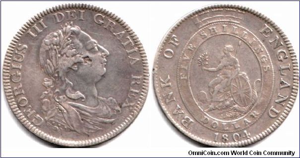 Five Shillings Bank Token. Banker mark on cheek.