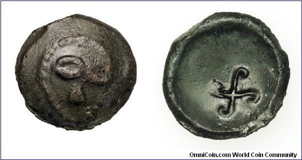 Celtic coin of the Parisii. A head, commonly refered to as a skull, on the obverse, a swastika reverse.