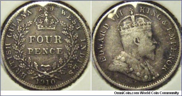 British Guiana and West Indies 1910 4 pence, featuring Edward VII. Somewhat F/VF. On auction @ coinpeople.com