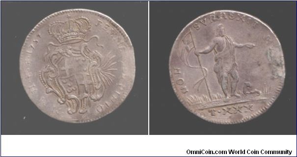 30 Tari. The large silver coins of Malta are very hard to find in collectable grades. I don't care what the catalogues may say about it. Many ended up being jewellery pieces, this one having suffered that fate at one stage.