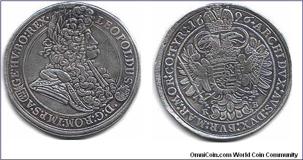 Leopold The Hogmouth. Taler struck at Kremnitz mint for circulation in Hungary. Nice dark toned high grade specimen.