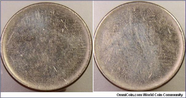 No date Quarter clad blank planchet error coin

Had to put date other wise got error on up load