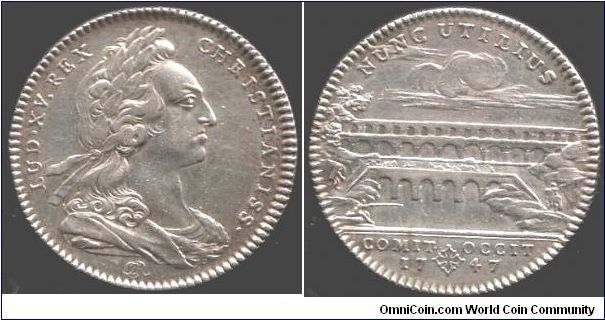 Silver jeton issued by Louis XV to commemorate the work carried out in 1747 inwidening the lower level carriageway of the Roman Aqueduct at Pont Du Gard, Nimes, France.