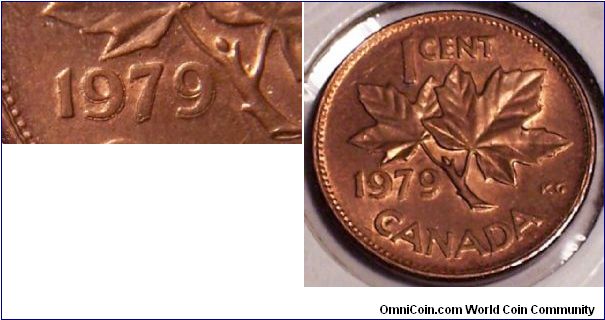 Canadian 1979 cent with doubling on the date and part of leaf.