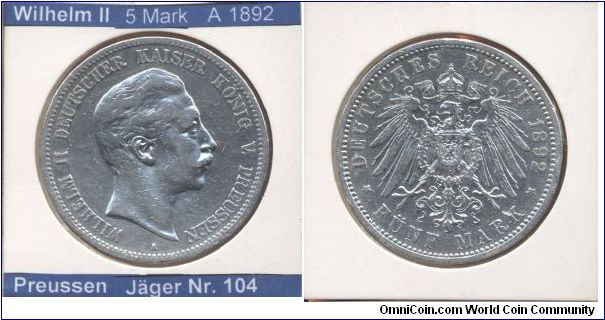 This is a coin from German Empire. 
Emperor Wilhelm II

5 Mark 1892
Mintmark A (~Berlin)