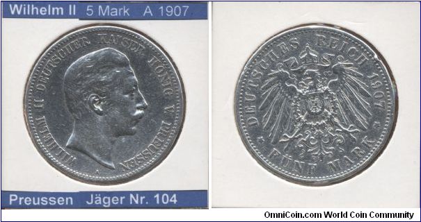This is a coin from German Empire. 
Emperor Wilhelm II

5 Mark 1907
Mintmark A (~Berlin)