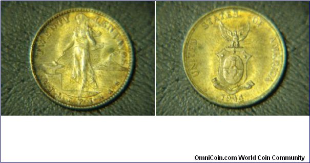 1944-D 20 Centavos. Nice original toning of orange and gold.