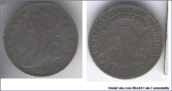 Bust half dollar, raw. Jeff is now the owner of this little lady! But I hate to  its picture lol!
