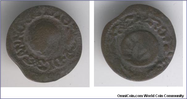 Spanish castle cob, raw. 1600's, multiple stamped dates. Interesting buldge in the center.