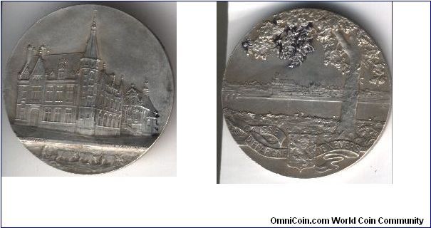 Beautiful silver medal of the `Caisse D'Epargne' (savings bank) de Nevers. Lovely perspective of the bank building and pastoral scenery of the Nivernais. Great detail work by Patey.