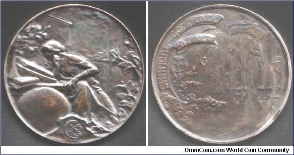 Dark toned silver art nouveau medal of the Chambre de Commerce, Nancy, France. The image of the chambre de Commerce buildiung (reverse) is almost ghost like.
