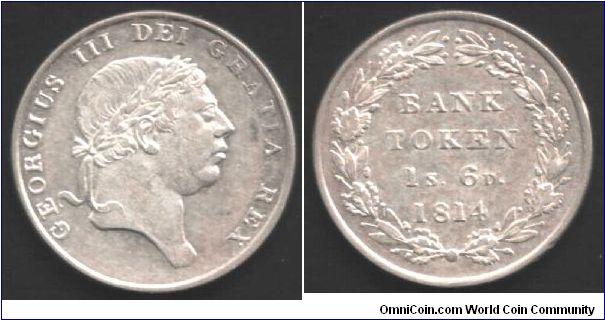 1s 6d Bank of England token. scanner is picking up some weird colouration. Coin is actually white and lustrous.
